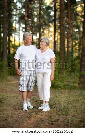 Portrait of a happy elder couple in the late spring outside