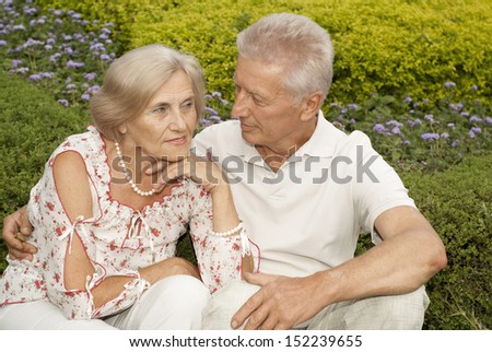 Beauteous elderly couple decided to take a walk in the park