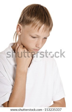 Sad worried teenage boy isolated on white background