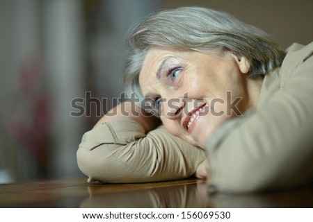 Lovely old woman smiling isolated in studio
