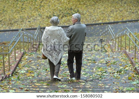 Happy elder couple enjoying each other\'s company