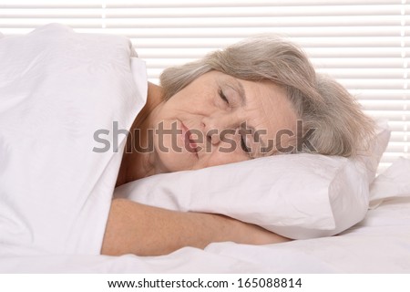 Beautiful Older Woman Sleeping In The Bedroom