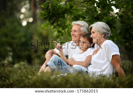 Happy Family Having A Picnic On A Sunny Summer Day