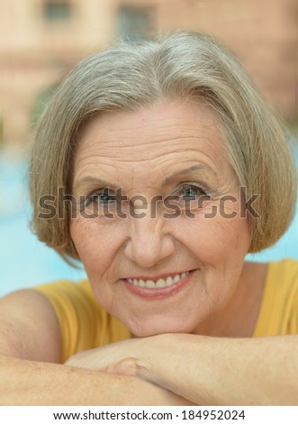 Portrait of a beautiful and happy smiling elderly woman
