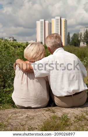 Happy elderly couple went for a walk on the nature
