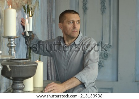 Portrait of thoughtful man in vintage interior
