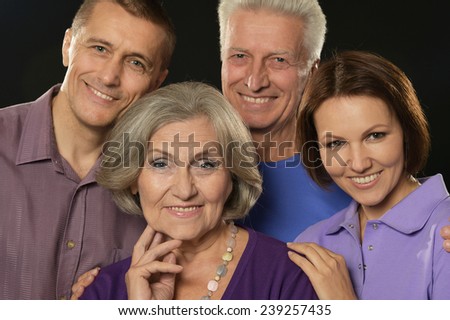 Cute family portrait with senior parents