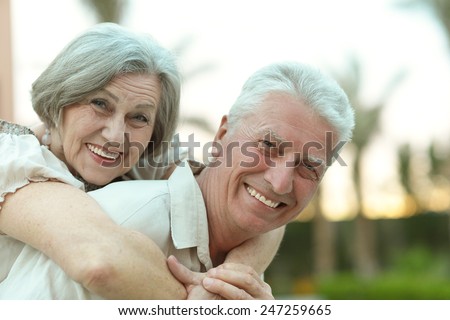 Senior couple resting on the resort during vacation