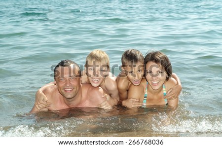 Portrait of a cheerful family have a great time