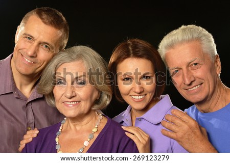 Portrait of a cute family portrait with senior parents