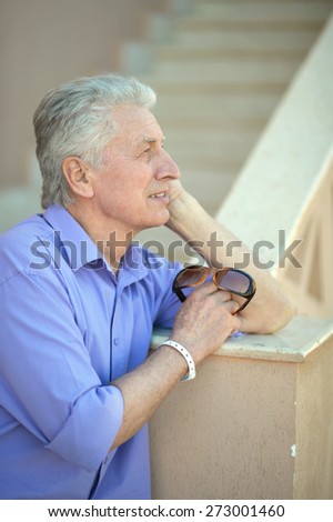 Portrait of a thinking senior man at the resort