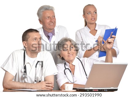 Group of doctors discussing at the table