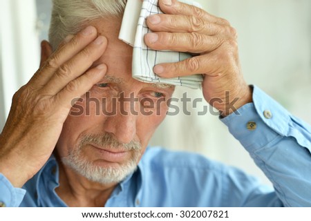 Portrait of a sick elderly man closeup