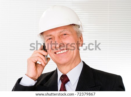 builder in the helmet on a white background