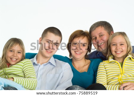 portrait of a happy family of five on white