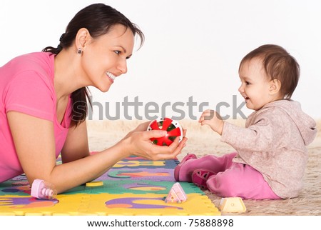 portrait of a happy mom and nice baby