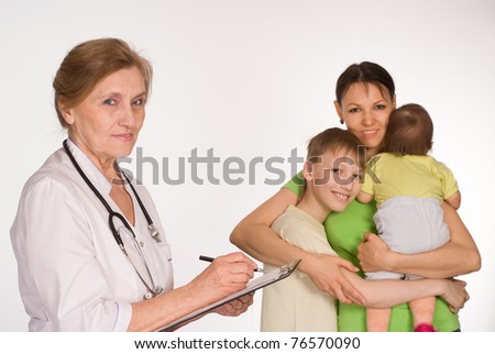 old doctor with the healthy patients on white