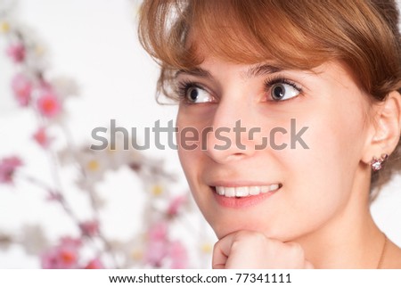 face of a nice girl with flowers