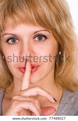 portrait of a cute senior woman making silence