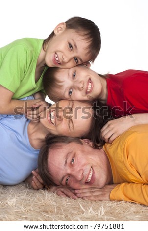 portrait of a prosperous family on a carpet