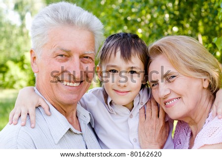 portrait of a grandson with his grandparents