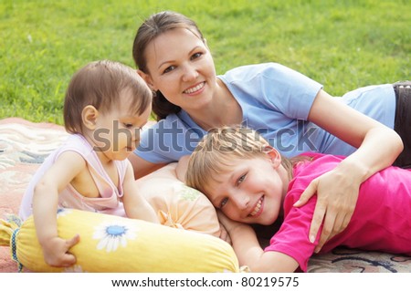happy family in color clothes at nature