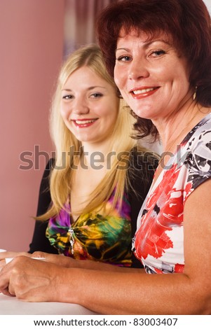 portrait of a mom and her adult daughter