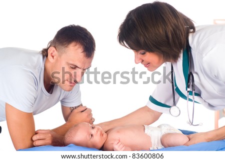 portrait of a nice nurse and dad with baby