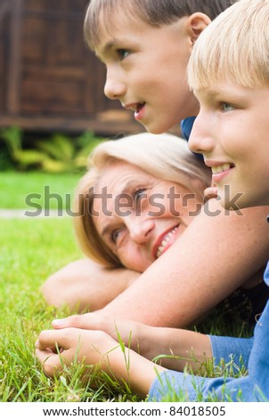 portrait of a cute granny with grandsons