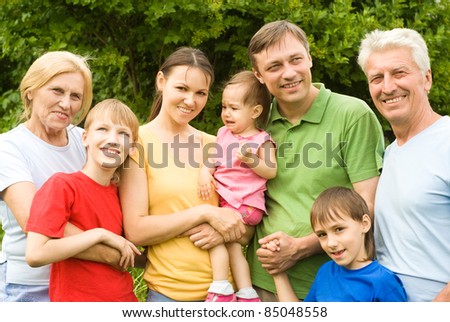 portrait of a cute family at nature