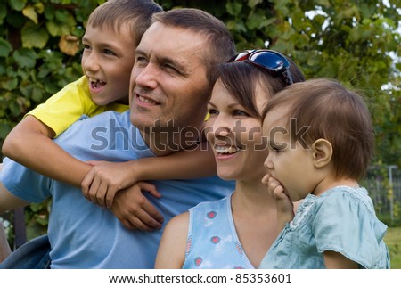 portrait of a nice family at nature