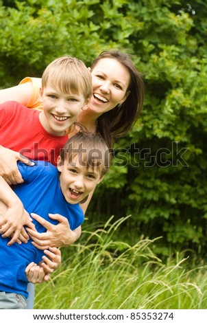 portrait of a cute family at nature