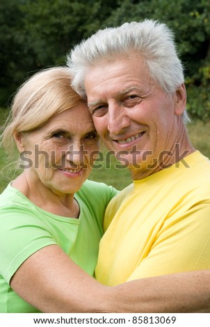 portrait of a cute old couple at nature