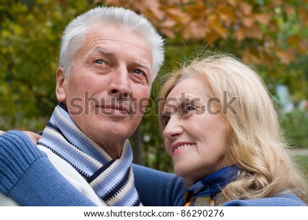 portrait of a nice old couple at nature