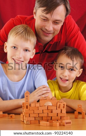 portrait of a cute boys playing with dad