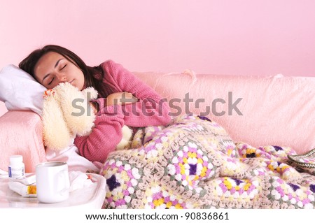 portrait of a girl in bed with toy