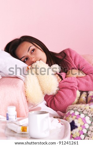 portrait of a girl in bed with toy