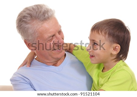 portrait of a cute grandfather and son