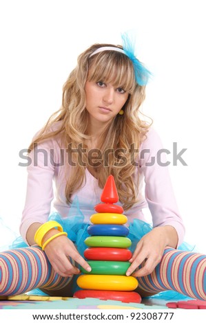 cute girl with funny socks on white