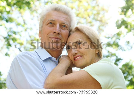 portrait of an old couple at park