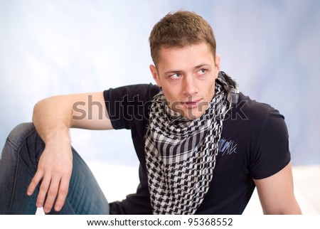 portrait of a cute modern guy posing