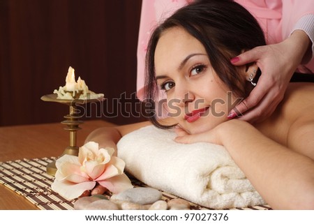 My dear beautiful happy luck woman on the procedure in the spa salon