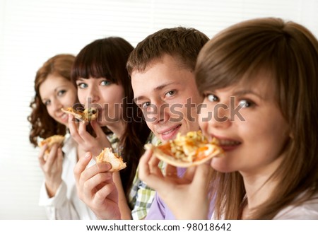 Bliss funny Caucasian campaign of four people eating pizza on a light background