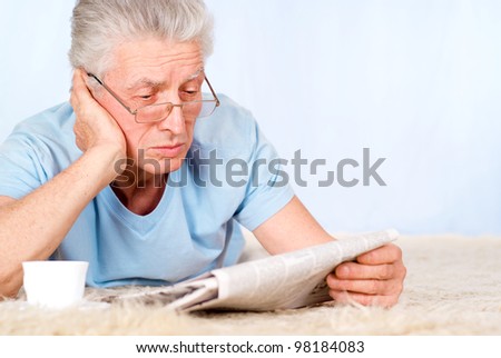 cute old man with paper and cup