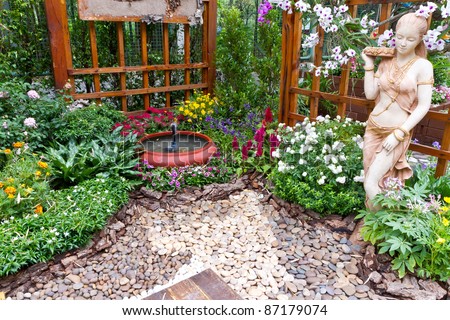 beautiful garden with small fountain