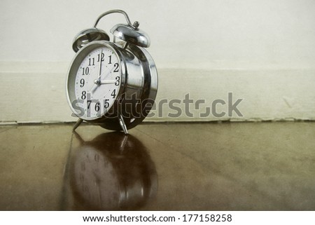 old alarm clock on the floor