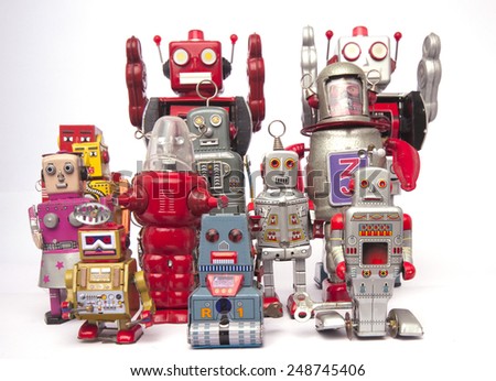 a team of  vintage robot toys