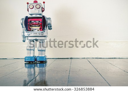 retro robot on old wooden floor