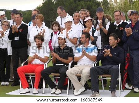 PONT ROYAL , FRANCE Ã¢Â?Â? OCTOBER 20, 2013 : Winner Edouard Espana (red pants) (FRA) During the  prize ceremony of the Masters 13  (Alps Tour), October 20, 2013 in Pont Royal en Provence, France.