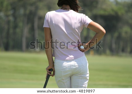 lady golf at putting